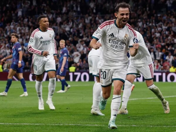Bernardo Silva corre eufórico celebrando su gol en el contundente triunfo del Real Madrid ante Leipzig